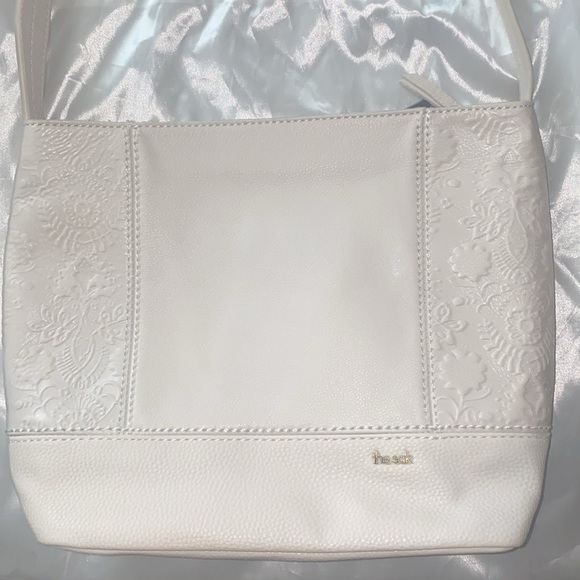 The Sak Handbags - NWT the Sak De Young Hobo embossed. Model:108396. Retail $149.00